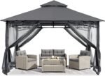 The gazebo is set up in the backyard with netting for protection from insects and sun exposure.